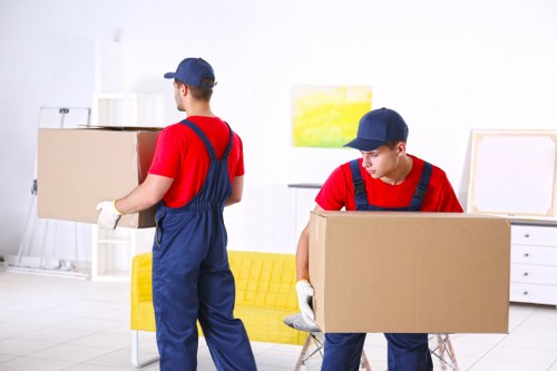 Student removals team planning a move in Soho streets
