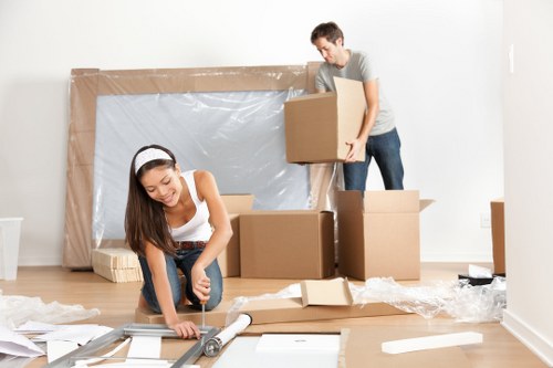 Removal team planning a move in a busy Soho street