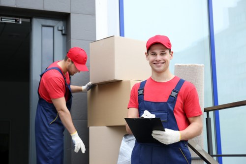 Commercial moving team handling office equipment in Soho