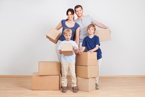 Local moving service handling boxes and furniture near Soho