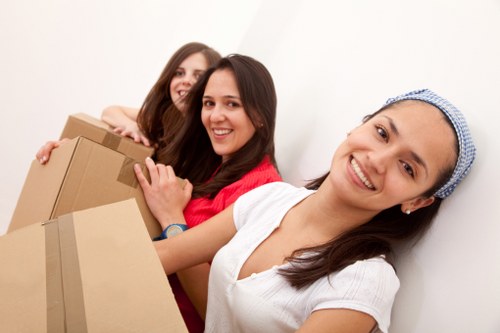 Packing boxes and belongings for a Soho student move