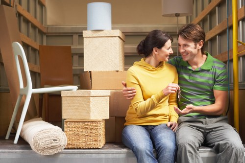 Preparation for a Soho man and van service with packed boxes and furniture
